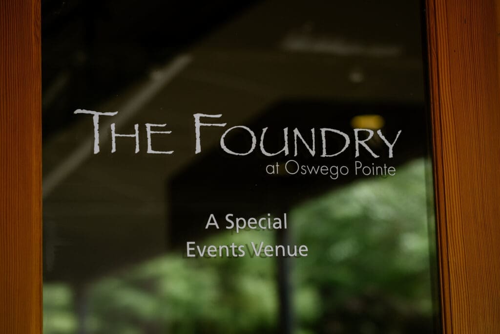 The Foundry at Oswego Pointe venue sign, the Lake Oswego wedding location for Carla and Eric