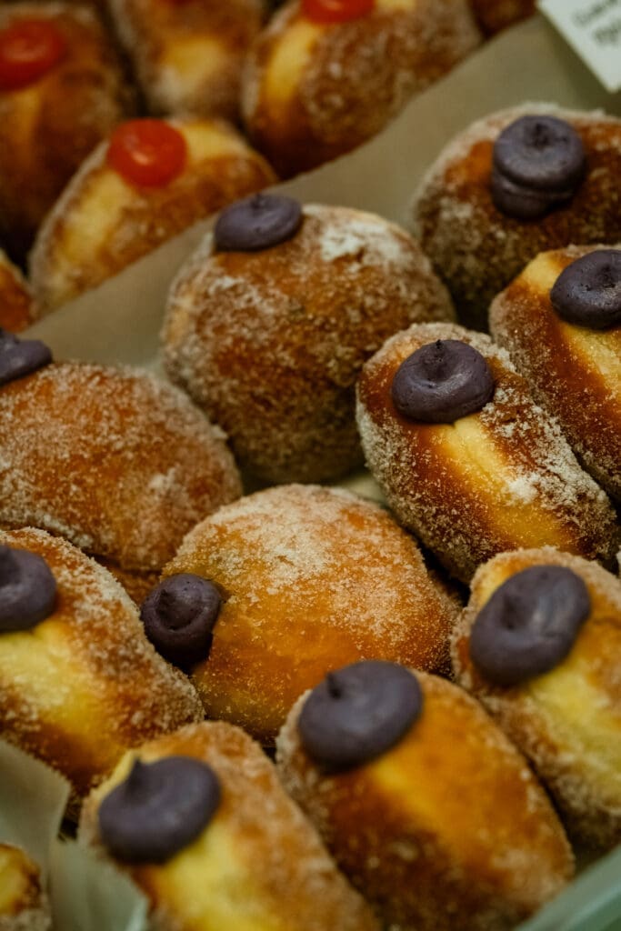 Sugar-dusted filled donuts on the dessert table at a Portland intimate wedding reception