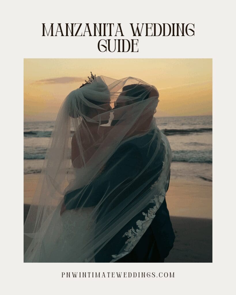Silhouetted couple embracing on the beach at sunset with veil blowing in the wind