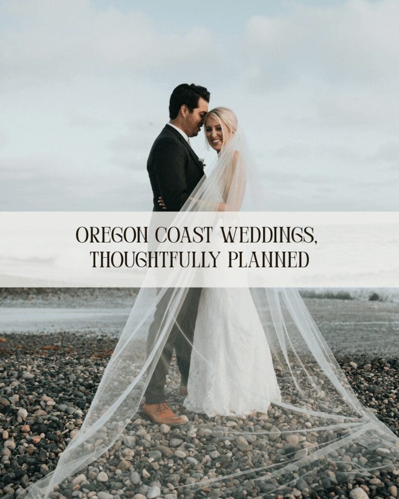 Newlywed couple embracing on an Oregon Coast beach with a flowing wedding veil